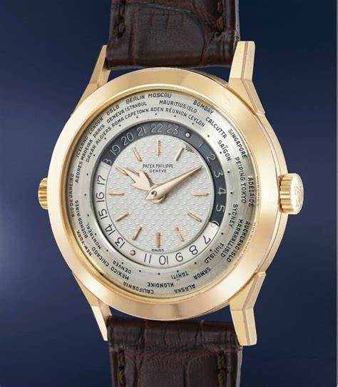 patek philippe worldtimer guilloché ref. 2523/1: $5.5 million. ...|Patek Philippe gold world timer.